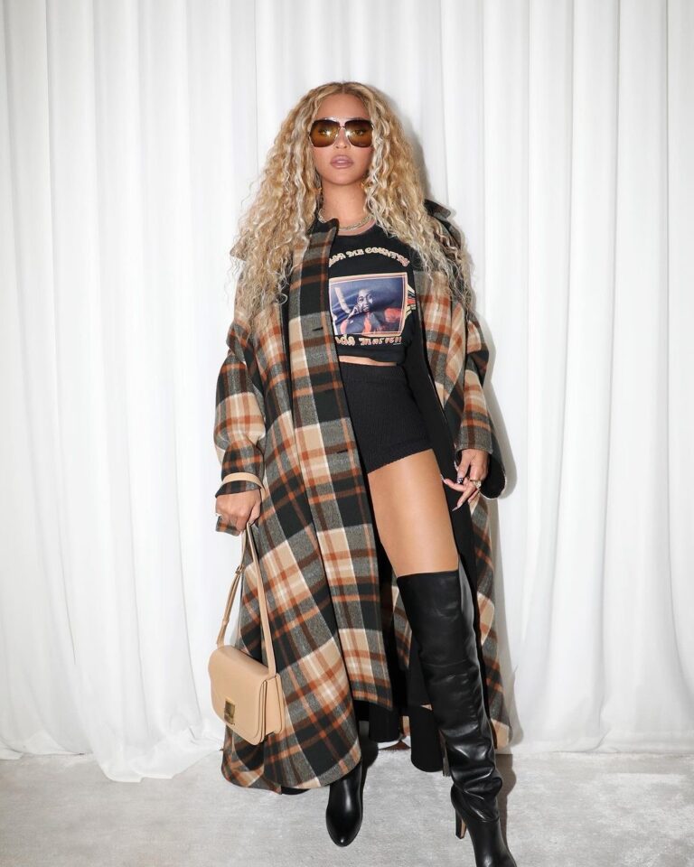 0 Beyonce Promotes Cowboy Carter in a Chloe Oversized Plaid Cape A Linda Martell Color me Country Tee Black Prada Knit Shorts and a Ferragamo Bag 1