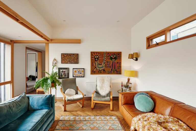 The living room of Hayley Pannekoeckes colorful beachside home